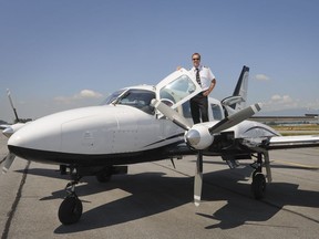 Island Express Air's president Gerry Visser shows off one of his airline's planes in 2012.