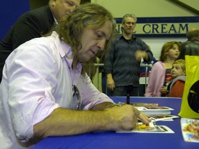 FILE PHOTO - Brett "The Hitman" Hart was busy signing autographs for fans prior to the WHL action between the Regina Pats and the Calgary Hitmen at the Brandt Centre in Regina Thursday October 20, 2011.