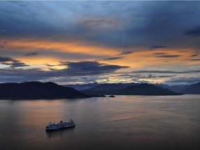 A ferry travels across Howe Sound, from Langdale to Horseshoe Bay. Burnco Rock Products is seeking to build gravel mine on the west side of Howe Sound.