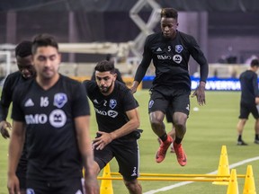 Montreal Impact defender Zakaria Diallo, rear, during practice at Olympic Stadium on Feb. 1, 2018.