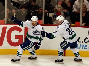 Daniel Sedin, left, and Henrik Sedin haven't announced what they'll do when the Vancouver Canucks' season ends next month, but they're still producing enough points to play on most NHL teams' second lines, writes Jason Botchford.