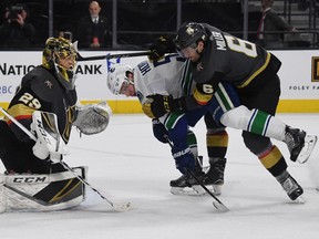 Bo Horvat of the Vancouver Canucks, who many expect will have to carry his NHL team down the stretch, is checked by Colin Miller of the Vegas Golden Knights at T-Mobile Arena on Feb. 23, 2018 in Las Vegas.