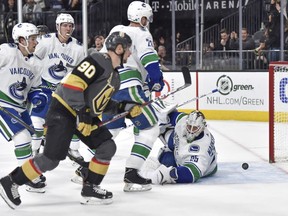 Tomas Tatar scores a goal against Jacob Markstrom in a 4-1 win for the Golden Knights.