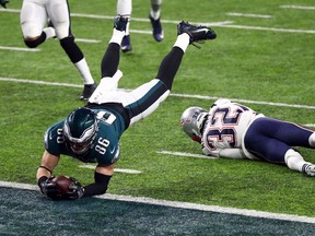 Zach Ertz of the Philadelphia Eagles catches an 11-yard touchdown pass in the team's Super Bowl win over the New England Patriots on Feb. 4. Or, does he? Ask the rules committee.