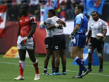 VANCOUVER, BC - MARCH 11: Alasio Sovita Naduva and teammate Amenoni Nasilasila of Fiji celebrate defeating Kenya during the gold medal game at Canada Sevens, the Sixth round of the HSBC Sevens World Series at the BC Place stadium Centre on March 11, 2018 in Vancouver, British Columbia, Canada.