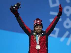 Bronze medallist Natalie Wilkie of Canada celebrates during the medal ceremony for Women's 1.5km Sprint Classic, Standing during day five of the Pyeongchang 2018 Paralympic Games on March 14, 2018.