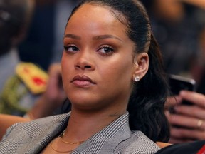 (FILES) In this file photo taken on February 2, 2018 Barbadian singer Rihanna attends the conference "GPE Financing Conference, an Investment in the Future" organised by the Global Partnership for Education in Dakar, as part of Macron's visit to Senegal. Rihanna on March 15, 2018 accused Snapchat of shaming domestic abuse victims after an advertisement made light of her beating by fellow pop star Chris Brown.The social media platform -- which counts 187 million users, especially young people drawn to its quickly vanishing posts -- had featured an advertisement for "Would You Rather?," a game app that asks sometimes provocative questions.