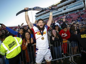 United States' Danny Barrett celebrates with fans after the U.S. defeated Argentina 28-0 in the final of the USA Sevens rugby tournament, Sunday, March 4, 2018, in Las Vegas. (Richard Brian/Las Vegas Review-Journal via AP)