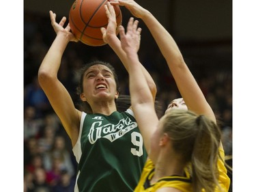 LANGLEY. March 03 2018..   Walnut Grove Gators #9 Jessica Wisotzki is shut down by a pair of Kelowna Owls in the final of the AAA Girls High School Basketball final at LEC, Langley, March 03 2018.   Gerry Kahrmann  /  PNG staff photo)( For Prov / Sun News )   00052469A Story by Steve Ewen [PNG Merlin Archive]