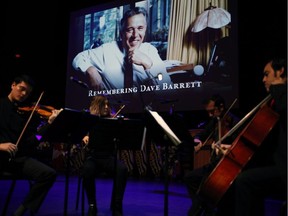 A string quartet plays for guests arriving to remember and celebrate former NDP Premier Dave Barrett during a state memorial service in the Farquhar Auditorium at the University of Victoria.
