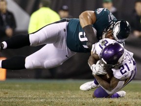 Eagles' Destiny Vaeao hits Vikings' Jerick McKinnon during the NFC championship game in Philadelphia on Jan. 21, 2018.