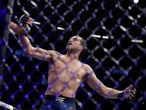 LAS VEGAS, NV - MARCH 03: Brian Ortega celebrates his victory over Frankie Edgar following their featherweight bout during UFC 222 at T-Mobile Arena on March 3, 2018 in Las Vegas, Nevada. Ortega won by TKO.