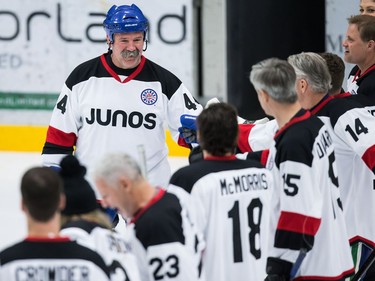 Former Vancouver Canucks defenceman Dave Babych is introduced during the Juno Cup hockey game in Burnaby on Friday.