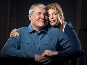 In this Monday March 26, 2018 photo, former Super Bowl MVP Mark Rypien poses with his wife Danielle, in Spokane, Wash. (Colin Mulvany /The Spokesman-Review via AP)