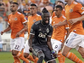 Vancouver Whitecaps' Kei Kamara reacts after scoring on a penalty kick against the Dynamo during an MLS game March 10 in Houston.