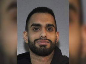 Pavandeep Uppal, 22, (pictured mugshot) was wanted by Surrey RCMP in relation to a violent kidnapping assault. His brother Jasondeep Uppal was also sought on the same charges.