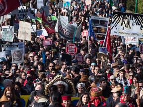Thousands of people march together during a protest against the Kinder Morgan Trans Mountain pipeline expansion in Burnaby, B.C.