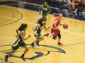 The Walnut Grove Gators, in green, beat the Abbotsford Panthers Friday night in the B.C. high school girls' triple-A provincial basketball championship semifinal to  earn a date in Saturday's final at the Langley Events Centre against the top-seeded Kelowna Owls.