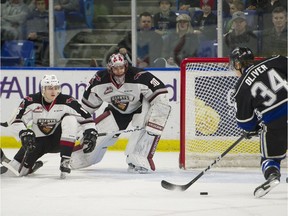 The Vancouver Giants and the Victoria Royals battle during Game 3 of their WHL playoff series at the Langley Events Centre on March 27.