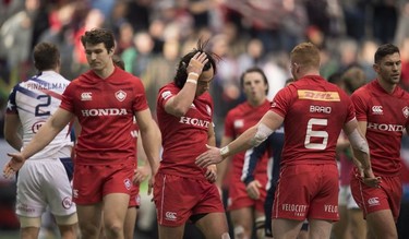 Team Canada reacts to loosing a match to the United States during the World Rugby Seven Series at B.C. Place in Vancouver, Saturday, March, 10, 2018.