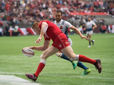 Canada's Connor Braid scores a try against France during World Rugby Sevens Series action, in Vancouver, B.C., on Sunday March 11, 2018.