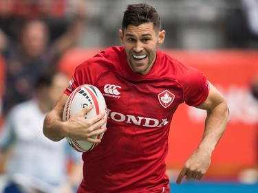 Canada's Justin Douglas runs the ball for a try against France during World Rugby Sevens Series action, in Vancouver, B.C., on Sunday March 11, 2018.
