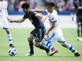 Veteran midfielder Felipe (left, in action against Ken Krolicki and the Montreal Impact earlier this season) was the best Whitecap last weekend against the L.A. Galaxy, but will be in tough this Saturday matching up against Federico ‘Pipa’ Higuain and his Columbus Crew. (Photo: Darryl Dyck, Canadian Press files)