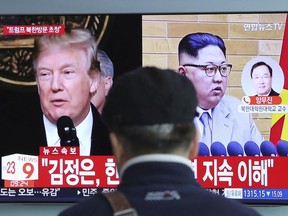 A man watches a TV screen showing North Korean leader Kim Jong Un, right, and U.S. President Donald Trump, left, at the Seoul Railway Station in Seoul, South Korea, Friday, March 9, 2018. Trump has accepted an offer of a summit from the North Korean leader and will meet with Kim Jong Un by May, a top South Korean official said Thursday,
