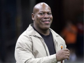 James "Quick" Parker, member of the 1985 BC Lions Grey Cup Championship team smiles while walking on the field during a half time ceremony for the Wall of Fame.