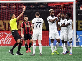 Mar 17, 2018; Atlanta, GA, USA; Vancouver Whitecaps defender Kendall Waston (4) issued a red card and ejected from the game after a video review where he elbowed Atlanta United defender Leandro Gonzalez (not pictured) during the first half at Mercedes-Benz Stadium.  Mandatory Credit: John David Mercer-USA TODAY Sports ORG XMIT: USATSI-379513 [PNG Merlin Archive]