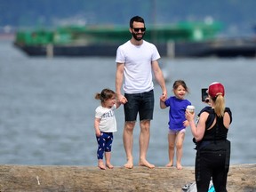 VANCOUVER, BC., May 21, 2017 -- People enjoy a sunny day. Metro Vancouver can expect spring weather this weekend, as the mercury climbs into the mid teens Sunday.