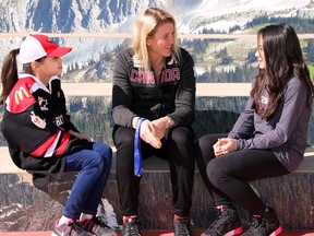Gabriella Lee, 8 years old, and Hayley Lee, 12 years old, of the Surrey Falcons sit and talk hockey and their ideas for WickFest Surrey with Hayley Wickenheiser.