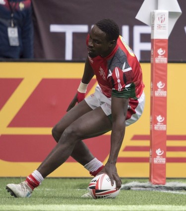 Nelson Oyoo of Kenya scores a try during a match against Spain at the World Rugby Seven Series at B.C. Place in Vancouver, Saturday, March, 10, 2018.