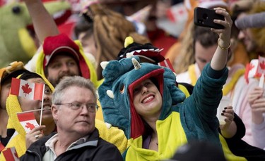 A rugby fan takes a selfie during the World Rugby Seven Series at B.C. Place in Vancouver, Saturday, March 10, 2018.