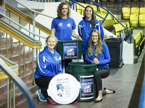 UBC T-Bird volleyball alumnus Laura MacTaggart (left) and current players (left to right) Danae Shephard, Sarah Haysom and Siobhan Finan have created a sustainability/recycling program for the school’s athletics teams. They’re collecting paired shoes, workout gear and other like items in bins at War Memorial Gymnasium. They’re also working on a survey of athletes to assess their environmental knowledge in hopes of coming up with ways to increase the sustainability.