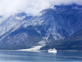 The view of a cruise liner exploring Glacier Bay national park (Alaska).