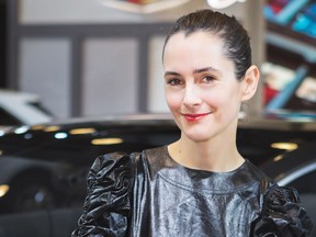 Karla Welch poses at the Vancouver International Auto Show.