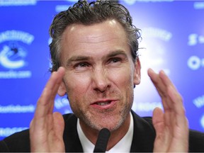 VANCOUVER, BC - APRIL 9:  Former Vancouver Canuck player Trevor Linden answers questions during a press conference where Linden was named as Canucks President of Hockey Operations at Rogers Arena April 9, 2014 in Vancouver, British Columbia, Canada.