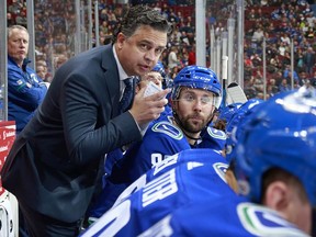 Head coach Travis Green and veteran forward Sam Gagner try to get on the same page during a game last season. Green moved Gagner all over the lineup, but wasn’t able to spark his offensive game. (Photo: Jeff Vinnick, NHLI via Getty Images files)