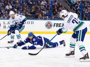 Victor Hedman of the Tampa Bay Lightning dives to block a pass from Loui Eriksson to Brandon Sutter of the Vancouver Canucks during the second period at Amalie Arena on December 8, 2016 in Tampa, Florida.