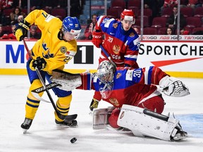 Goaltender Ilya Samsonov #30 of Team Russia tries to defend the puck against Jonathan Dahlen #27 of Team Sweden during the 2017 IIHF World Junior Championship bronze medal game at the Bell Centre on January 5, 2017 in Montreal, Quebec, Canada. Team Russia defeated Team Sweden 2-1 in overtime and win the bronze medal.