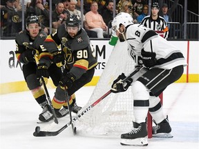 Drew Doughty battles Golden Knights Erik Haula #56 and Tomas Tatar #90 during Game 1 in Las Vegas. The L.A. Kings defenceman has been suspended one game for a hit on William Carrier.