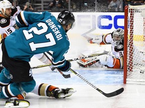 Joonas Donskoi of the San Jose Sharks shoots and scores past goalie John Gibson of the Anaheim Ducks.