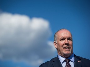 British Columbia Premier John Horgan speaks during a news conference with Washington State Gov. Jay Inslee last month.