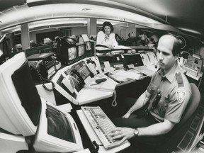 APRIL 14, 1991: VANCOUVER, B.C. – Chief dispatcher Doug LePard (foreground) is pictured at a terminal at the 911 dispatch centre.