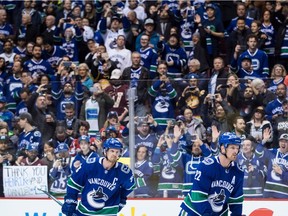 Vancouver Canucks' Henrik, left, and Daniel Sedin will try to crank it up one last time for Saturday's NHL game in Edmonton. Once they're done playing the Oilers, the Sedins' retirement party will be officially underway.