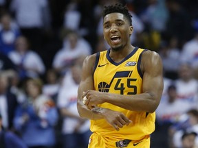 Utah Jazz guard Donovan Mitchell celebrates after the Jazz defeated the Oklahoma City Thunder in Game 2 of an NBA basketball first-round playoff series in Oklahoma City, Wednesday, April 18, 2018.