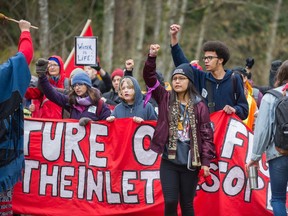 Protesters against the Kinder Morgan pipeline expansion at the gates of Kinder Morgan Canada in Burnaby on March 20.