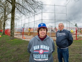 President of Vancouver minor baseball Mary McCann and Tony Borean, vice-president of Vancouver minor baseball, at the southeast diamond at Nanaimo Park in Vancouver on April 3.