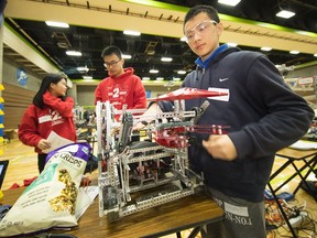 Students and their robots compete in a game called In the Zone at BCIT as part of a provincial competition.